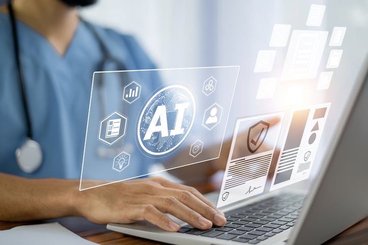 Healthcare professional using AI technology on a laptop