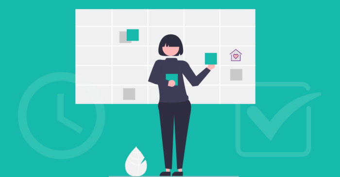 Person organizing tasks on a wall planner with icons representing time management and productivity
