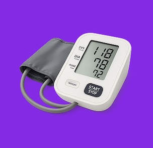 Digital blood pressure monitor with cuff and display on purple background