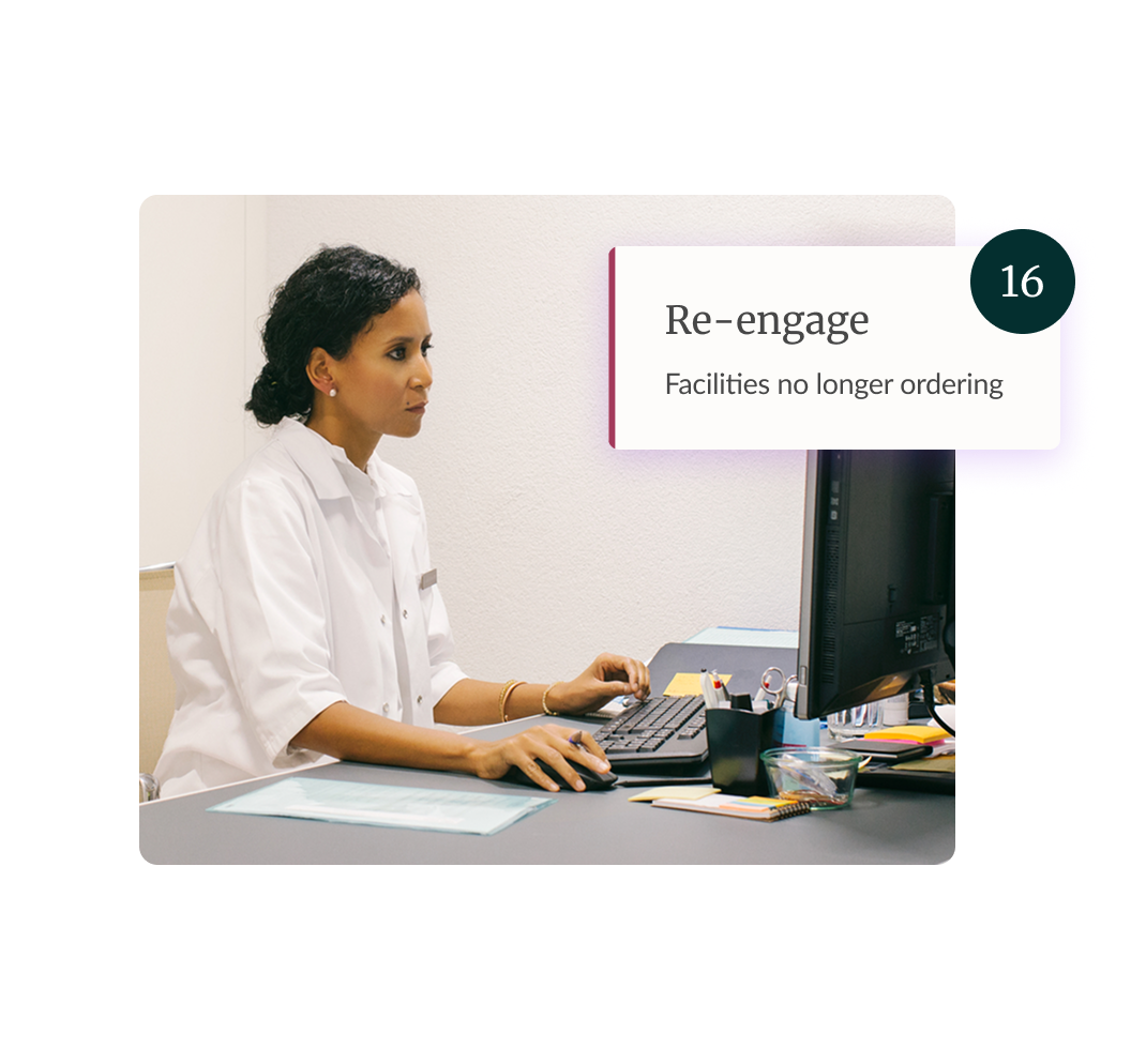 Healthcare professional working on a computer in an office setting